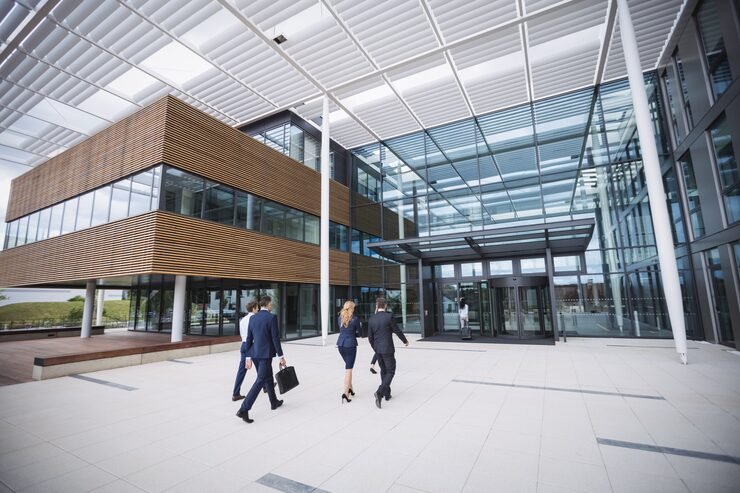 business people entering office building 107420 74363